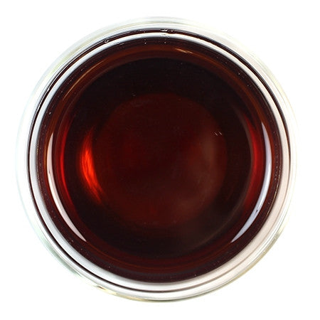 Brewed pu-erh tea in a cup